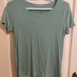 Me to We teal t-shirt